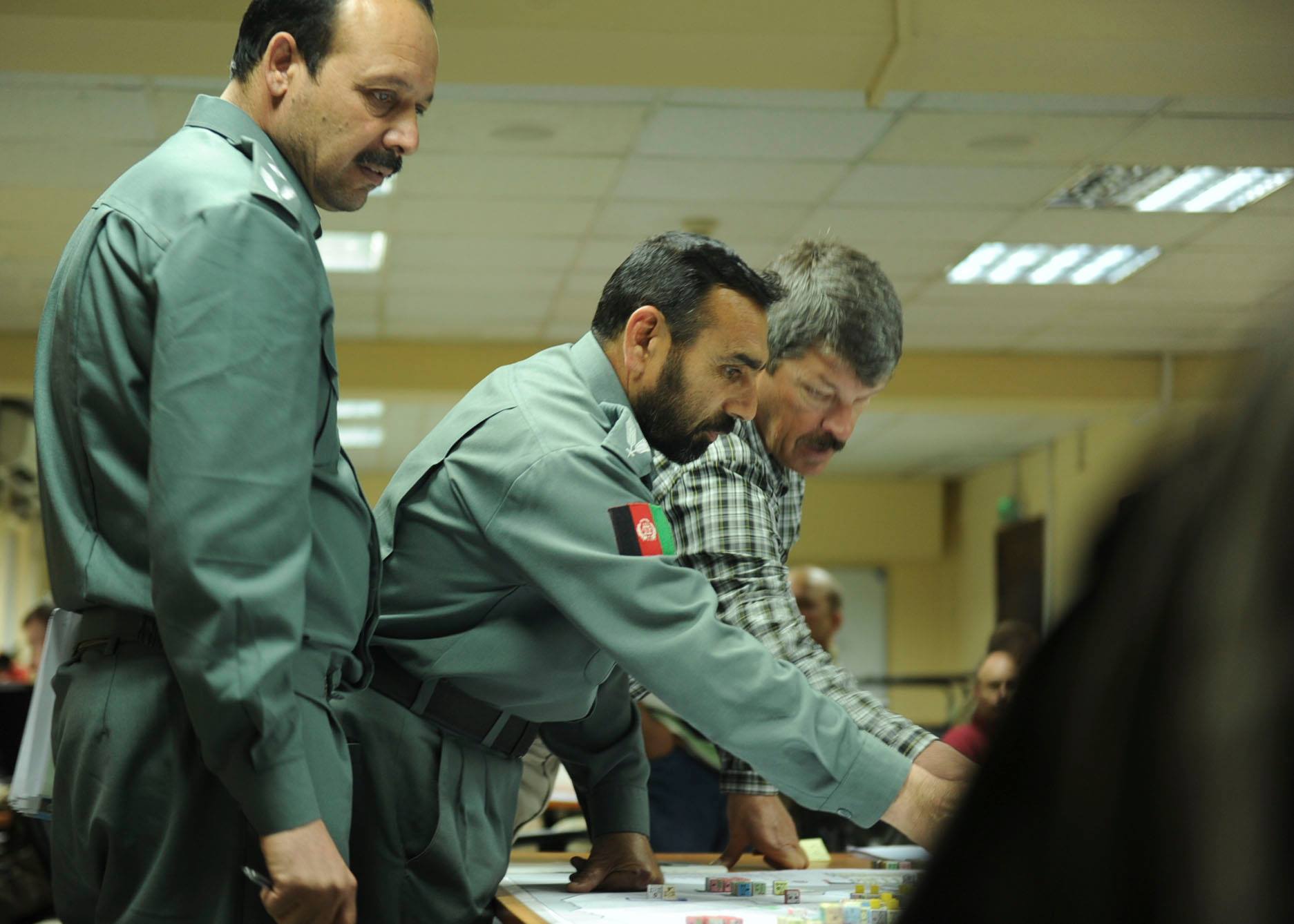 A Resolute Support team works with ‪officers from the ‪Afghan interior and defence ministries during a simulation exercise looking at the effect of different decisions on the effectiveness and affordability of ​the ANSF in the future. NATO’s Warsaw summit will also be considering funding of ANSF, as well as the deployment of international forces, 8-9 July 2016. (Photo: NATO - Resolute Support Mission, DATE: May 19, 2016)