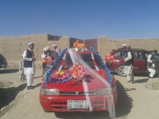 A decorated car often accompanies the bride as she travels from her parent’s house to the house of new in-laws. In this wedding in the Ibrahimzi area of Deh Yak district in Ghazni province, the bride price was 11,000 US dollars. (Author’s photo: 2014)
