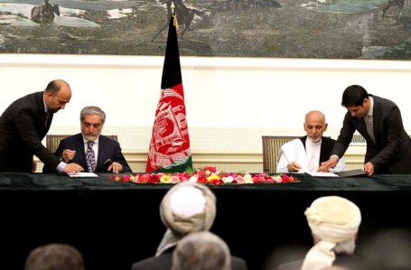 The signing of the National Unity Government political agreement by Dr Abdullah Abdullah and Ashraf Ghani took place at the Presidential Palace on 21 September 2014 in the presence of Afghanistan's key political figures, government officials and members of the campaign teams of both candidates. (Photo Source: Tolo News 2014)