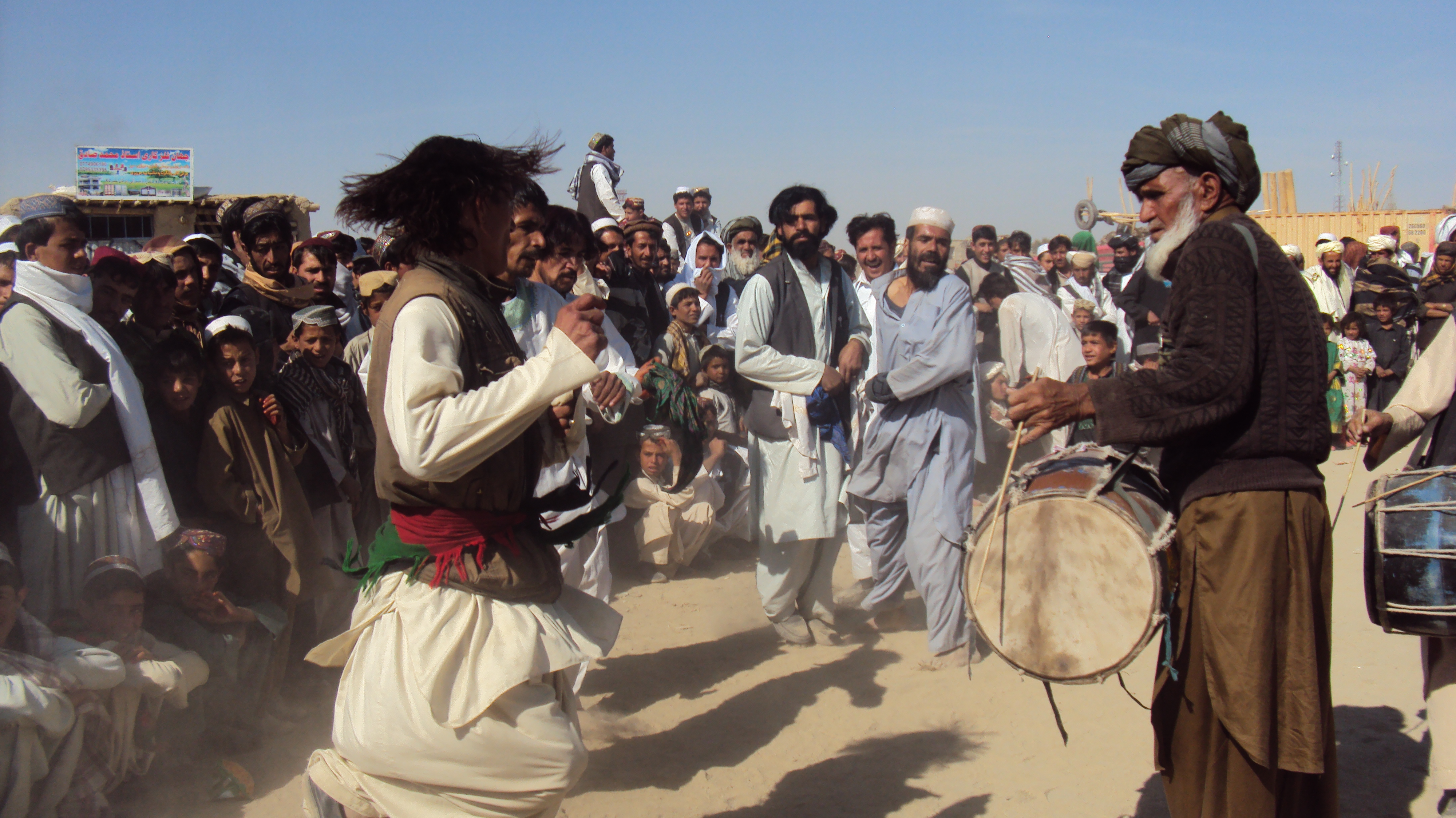 Men dance the attan in Andar district of Ghazni, Eid al Fitr, 28 October, 2012. Photo: Fazal Mazhary