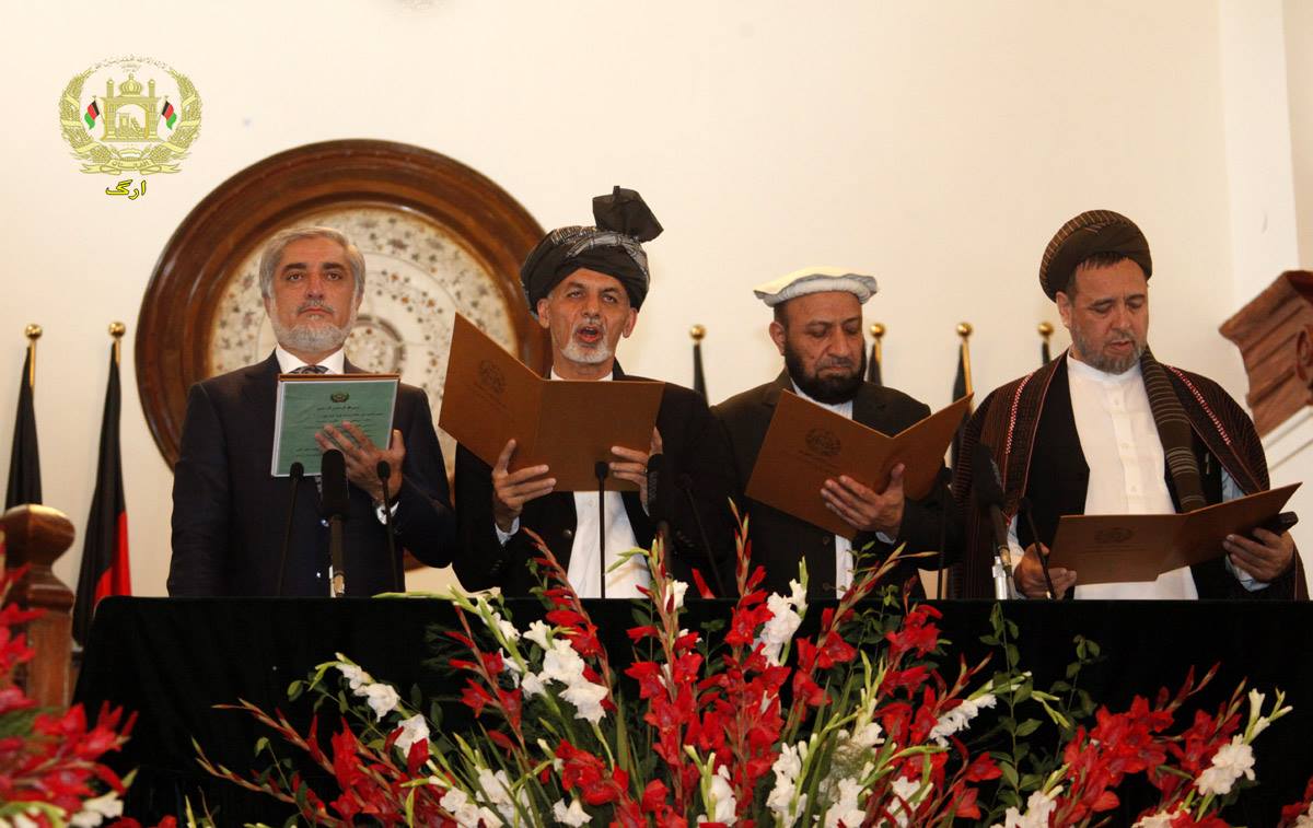 President Ashraf Ghani administering the swearing-in of Chief Executive Abdullah and his deputies on 29 September 2014. Photo: 29 September 2014, Palace Facebook page