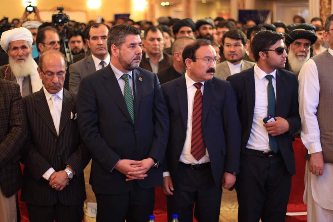 Two of Mehwar leaders, former NDS chief Nabil and former transport minister Najafi, along with other participants standing for national anthem during Mehwar's inauguration ceremony in Kabul on 16 July 2017. Credit: Mehwar