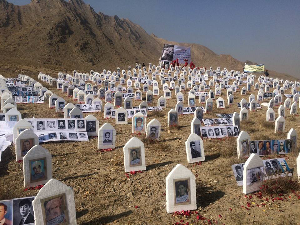 Photographs of those who disappeared in AGSA custody, placed by family members in the Puligun (Polygon) area of Pul-e Charkhi, where mass graves have been found. Families hold a ceremony every year on 10 December to remember their lost relatives (Photo: Victims’ Families Association, with permission, 2016)