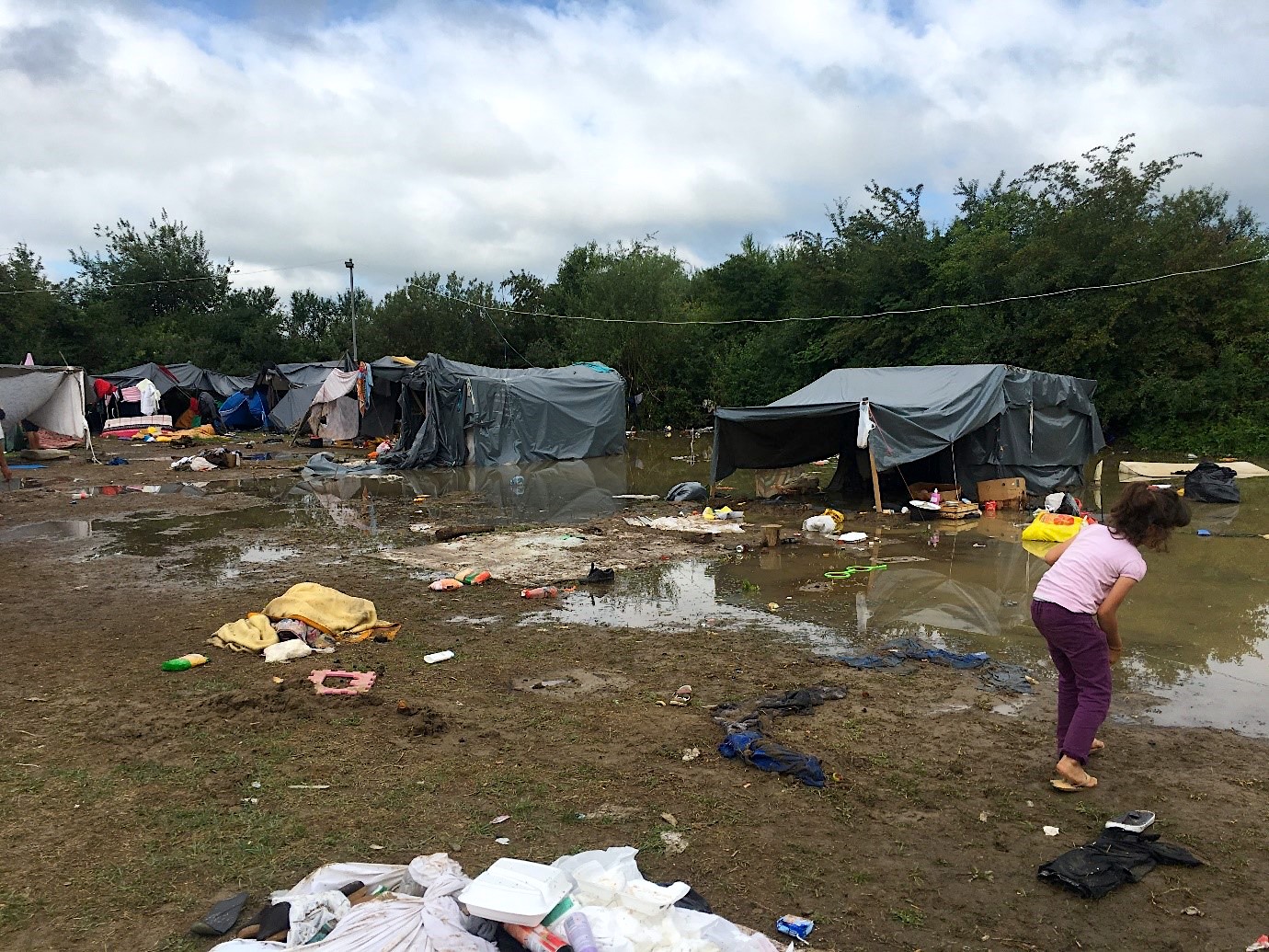 Main informal camp after the storm on 17 July 2018 in Velika Kladusa, a town in northwest Bosnia. Photo: Elizabeth Wait, 2018.