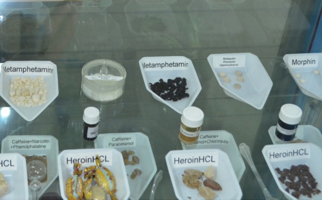 Samples of methamphetamine and other synthetic drugs, like ecstasy and MDMA, exhibited in the display cabinet of state-of-the-art CNPA forensics lab in Kabul, Afghanistan (Photo by Jelena Bjelica 2015)