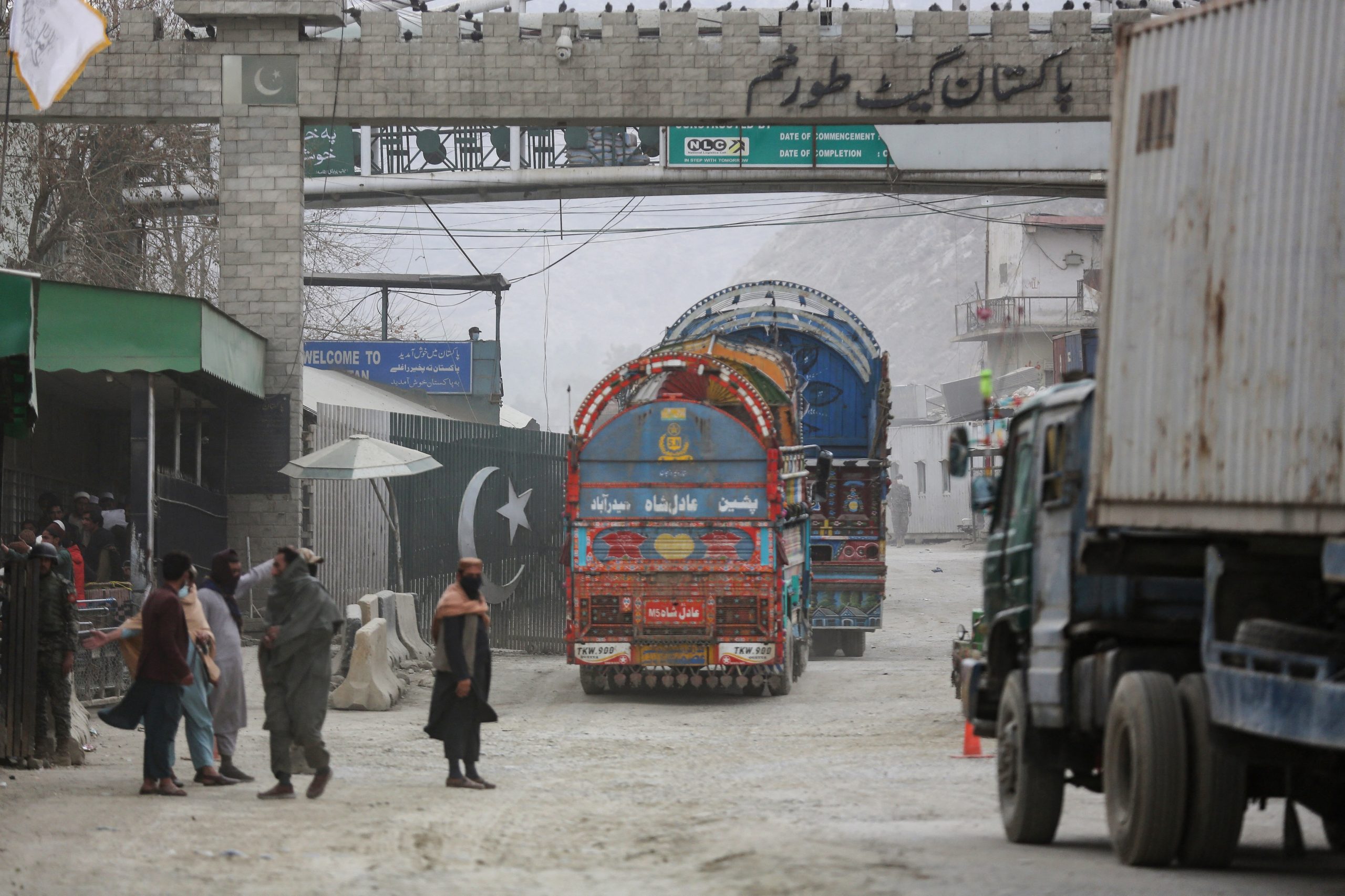 Goods trucks cross from Afghanistan into Pakistan at Torkham. Photo: Shafiullah Kakar/AFP, 25 February 2023