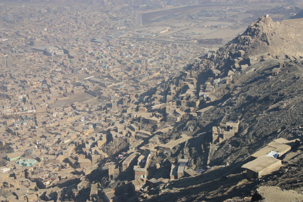 Houses on the slopes above Kabul built on state land. In old city below, much of which was destroyed in the 1990s civil war, land grabbing and informal development has taken place, largely on private land. Photo: Fabrizio Foschini, 2012