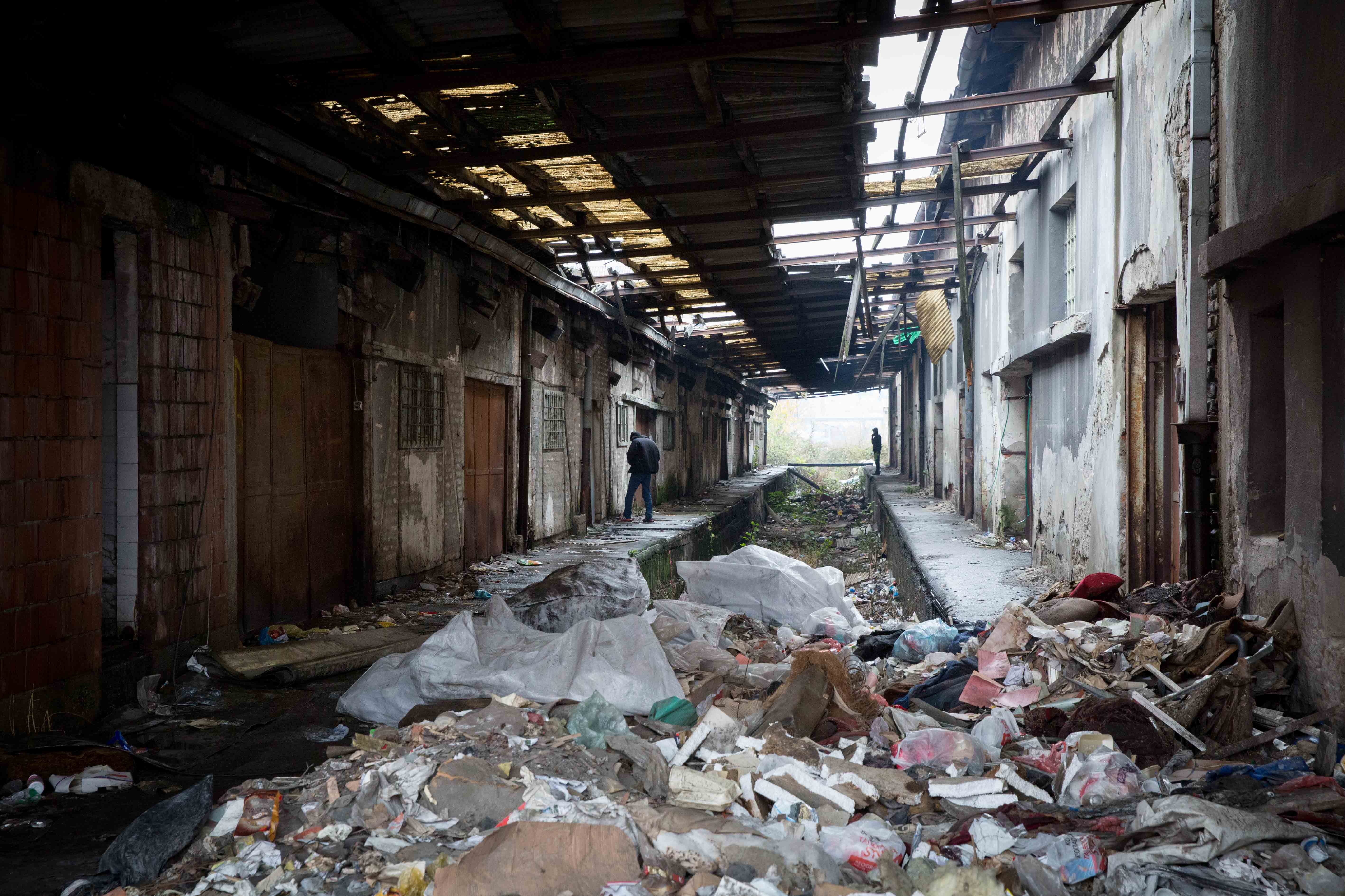A space between two warehouses was used a rubbish dump and public toilet. Photo: Martine van Bijlert